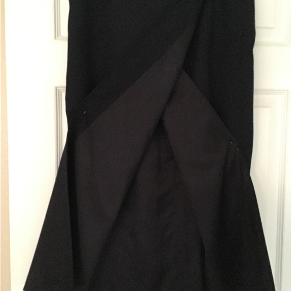 The Broadway 100% wool Navy wrap skirt. Size 14.